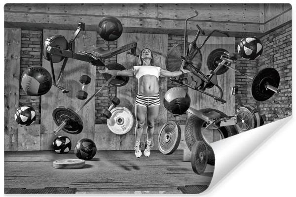 Fototapeta Kobieta Lewitująca Między Sprzętem Sportowym