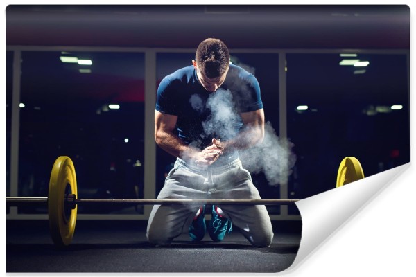 Fototapeta Sztangista Przygotowujący Się Do