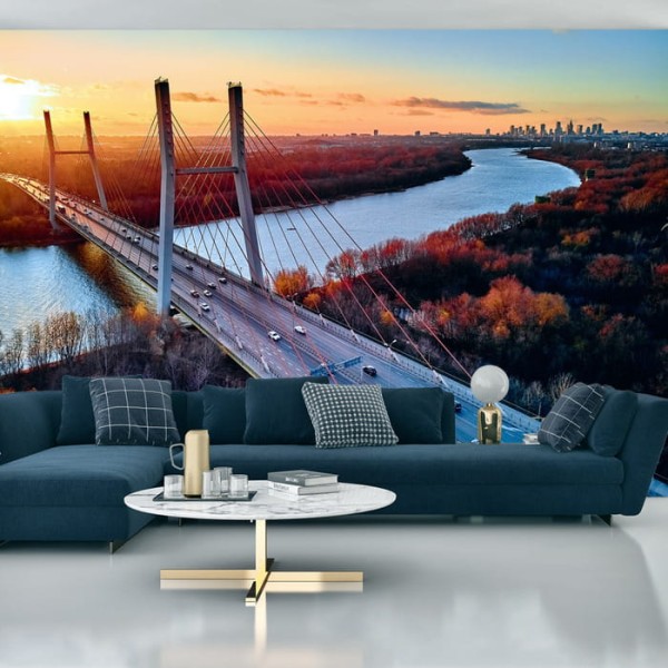 Fototapeta Beautiful Panoramic Aerial Drone View To Cable-Stayed Siekierkowski Bridge Over The Vistula River And Warsaw City Skyscrapers, Poland In Gold Red Autumn Colors In November Evening At Sunset