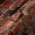 Vliestapete mit natürlicher Steinoptik – Rot, orange, Braun_0004.webp
