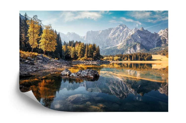 Fototapeta Awesome Sunny Landscape In The Forest. Wonderful Autumn Scenery. Picturesque View Of Nature Wild Lake. Sun Rays Through Colorful Trees. Incredible View On Fusine Lakeside. Amazing Natural Background