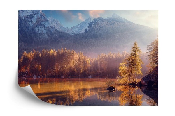 Fototapeta Awesome Nature Scenery. Beautiful Landscape With High Mountains With Illuminated Peaks  Stones In Mountain Lake  Reflection  Blue Sky And Yellow Sunlight In Sunrise. Amazing Nature Background.